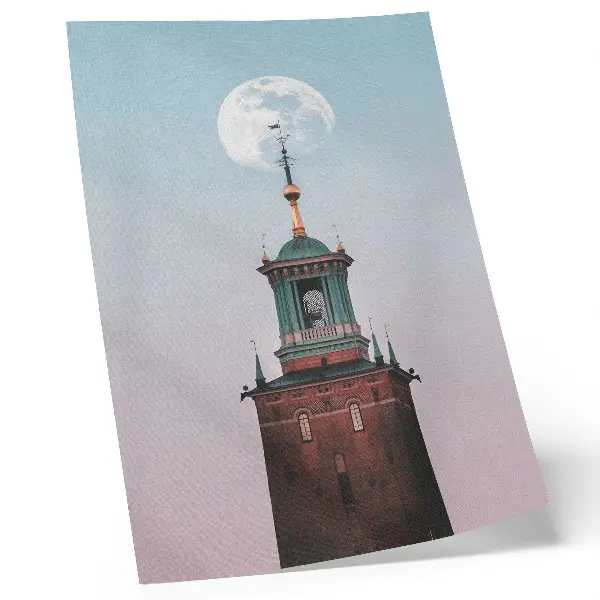 Impression sur toile représentant une tour sous une lune avec un fond pastel calme