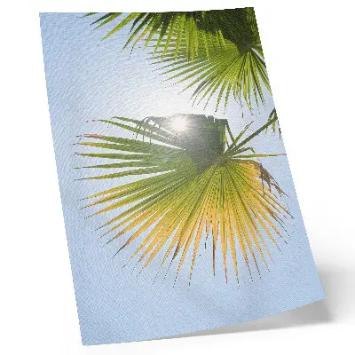 Décoration murale feuilles de palmier sur fond bleu avec un soleil