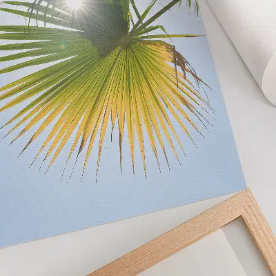 Décoration murale feuilles de palmier sur fond bleu avec un soleil