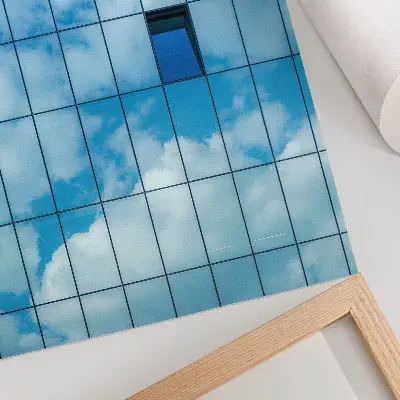 Impression sur toile façade de verre reflétant le ciel et les nuages