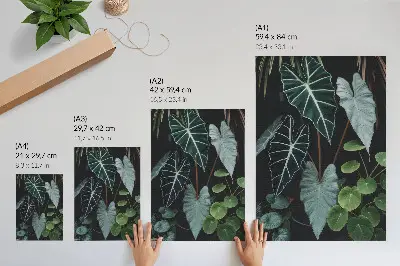 Impression sur toile représentant des feuilles vertes sur un fond sombre dans un style moderne