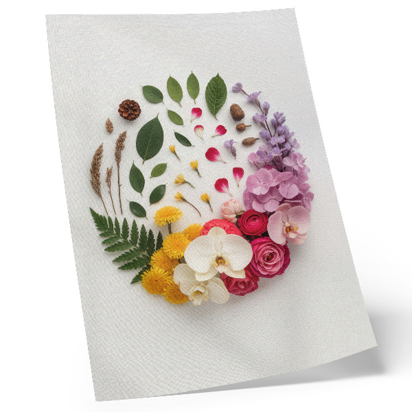 Impression sur toile Une composition colorée de fleurs et de feuilles en harmonie