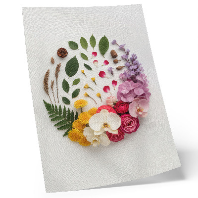 Impression sur toile Une composition colorée de fleurs et de feuilles en harmonie