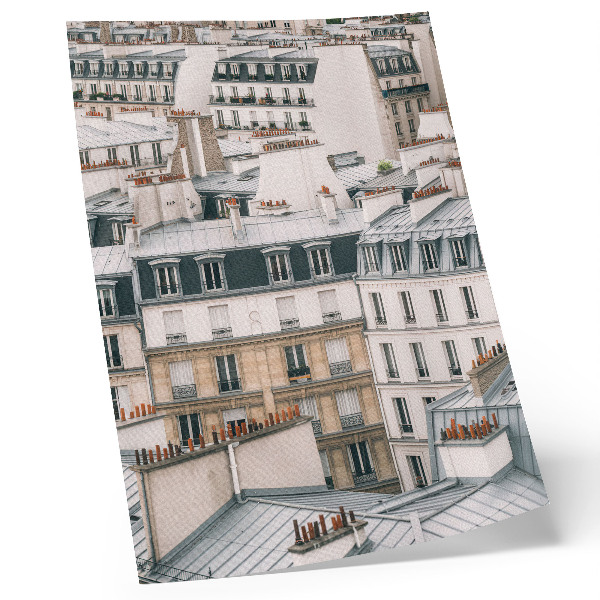 Impression sur toile Toits et cheminées symétriques des bâtiments