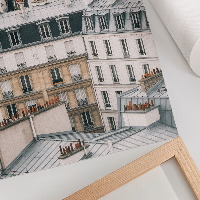 Impression sur toile Toits et cheminées symétriques des bâtiments