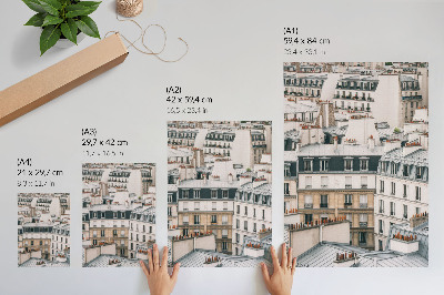 Impression sur toile Toits et cheminées symétriques des bâtiments