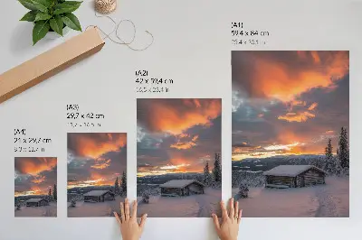 Impression sur toile représentant un abri d'hiver sous un ciel orange