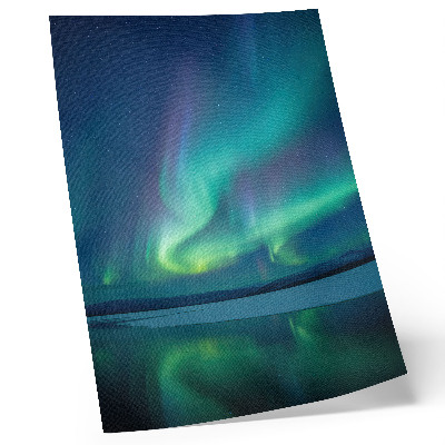 Impression sur toile Les aurores boréales en arrière-plan d'une magnifique nature nocturne