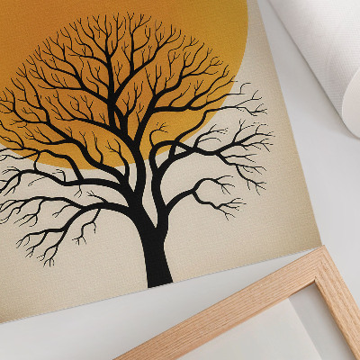 Impression sur toile Un arbre se détachant sur le fond d'un grand cercle aux teintes chaudes