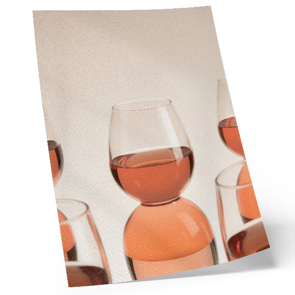 Impression sur toile Verres contenant un liquide rose sur fond clair