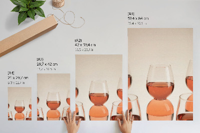 Impression sur toile Verres contenant un liquide rose sur fond clair