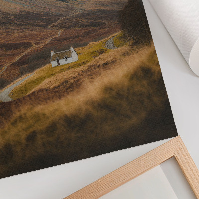 Décoration murale Un paysage de montagne avec un chalet isolé au milieu de la nature