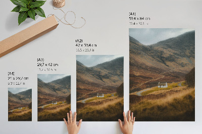 Décoration murale Un paysage de montagne avec un chalet isolé au milieu de la nature