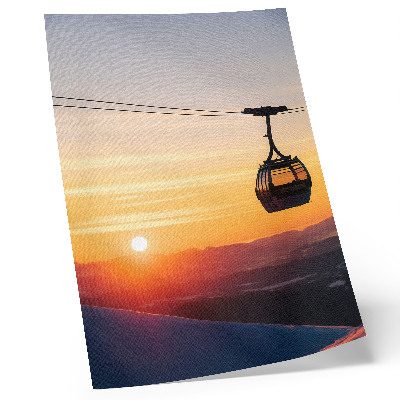 Impression sur toile Téléphérique au coucher du soleil dans les montagnes