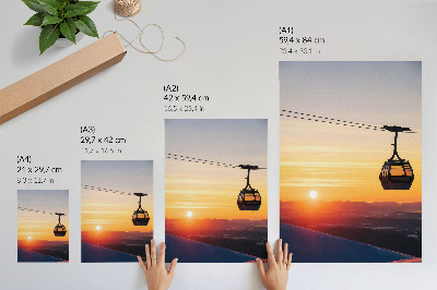 Impression sur toile Téléphérique au coucher du soleil dans les montagnes