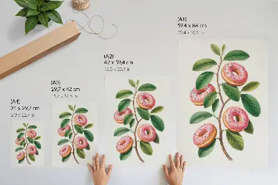 Décoration murale avec des bourgeons roses, des feuilles vertes et une brindille humoristique