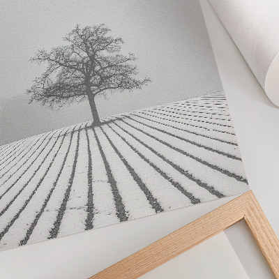 Impression sur toile Arbre dans la neige, paysage hivernal minimaliste