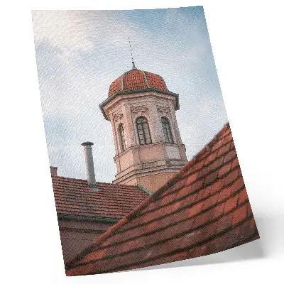 Impression sur toile tour rustique avec un toit de briques et de tuiles sous un ciel bleu