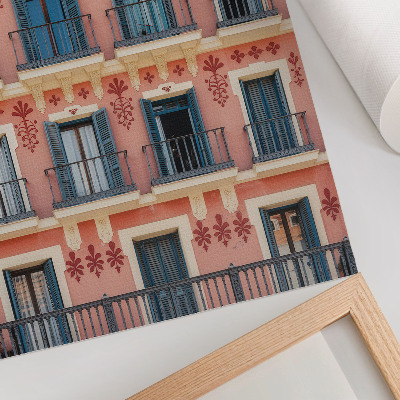 Impression sur toile Façade symétrique avec volets bleu marine et décorations florales