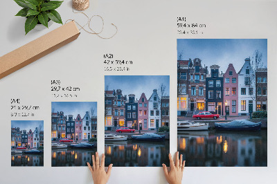 Impression sur toile Immeubles colorés, ambiance du soir, reflets dans l'eau