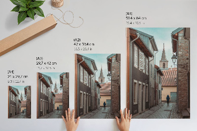 Impression sur toile Rue étroite, immeubles de rapport, tour, manteau bleu