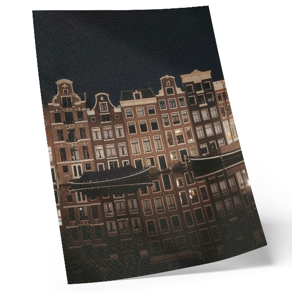 Impression sur toile La ville nocturne se reflète dans l'eau