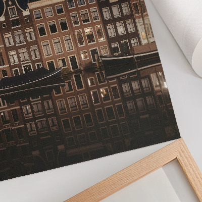 Impression sur toile La ville nocturne se reflète dans l'eau