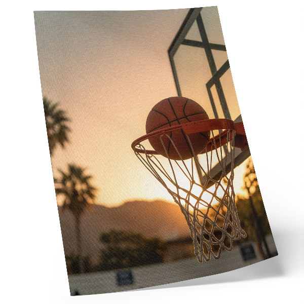 Impression sur toile Ballon de basket-ball énergique au coucher du soleil
