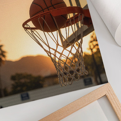 Impression sur toile Ballon de basket-ball énergique au coucher du soleil