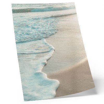 Affiche décorative Des vagues qui caressent doucement le sable, une atmosphère calme