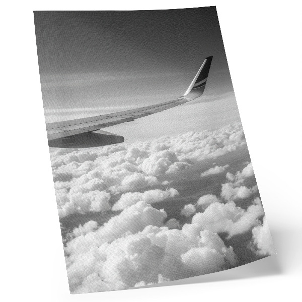 Affiche décorative Aile d'avion au-dessus des nuages, style noir et blanc