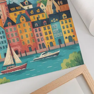 Décoration murale représentant des bâtiments colorés au bord d'une eau calme sous un climat doux