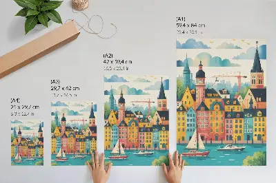 Décoration murale représentant des bâtiments colorés au bord d'une eau calme sous un climat doux