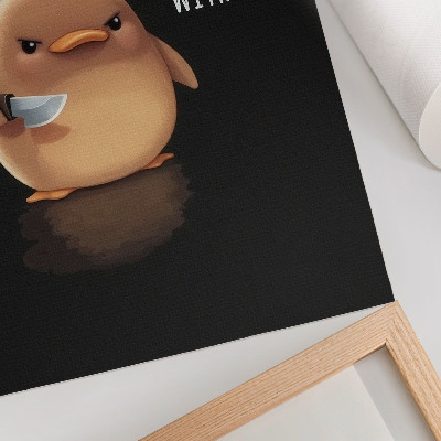 Impression sur toile Un adorable canard avec un couteau sur fond noir