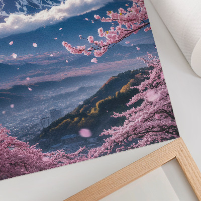 Impression sur toile Montagnes et cerisiers en fleurs sous un ciel rose