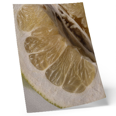 Impression sur toile Une tranche d'agrume avec des segments juteux