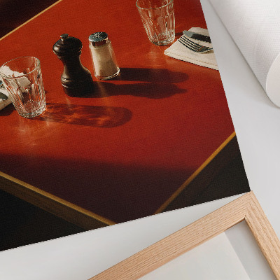 Affiche décorative Une table dans un restaurant avec des épices et des verres