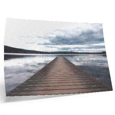 Affiche Un quai pittoresque au bord du lac avec vue sur les montagnes