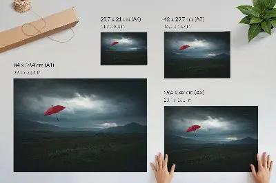 Affiche et poster représentant un parapluie rouge sur fond de nuages sombres et de paysage montagneux