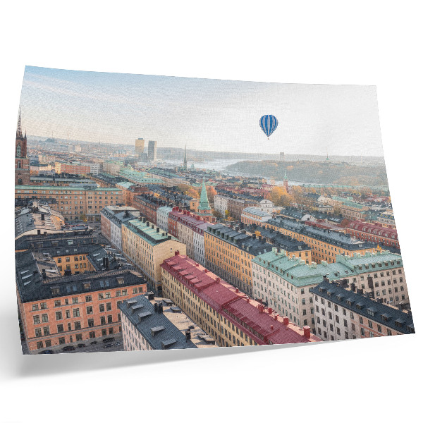 Affiche et poster Ballons colorés survolant les immeubles dans le ciel