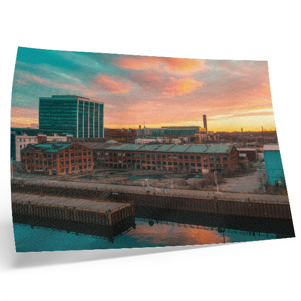 Affiche Bâtiments industriels au coucher du soleil, atmosphère paisible