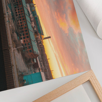 Affiche Bâtiments industriels au coucher du soleil, atmosphère paisible