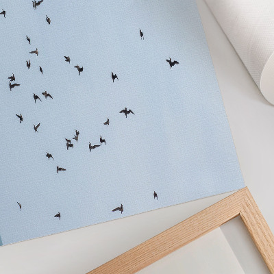 Affiche Un vol d'oiseaux au-dessus de la mer bleue