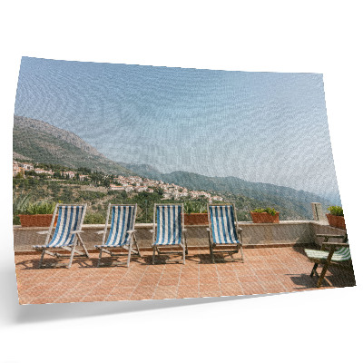 Affiche et poster Chaises longues sur la terrasse avec vue sur les montagnes