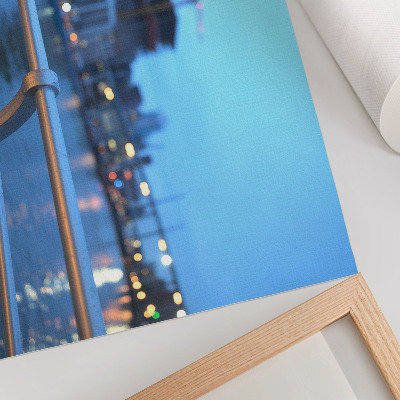 Affiche Le front de mer de la ville le soir, avec des lumières floues