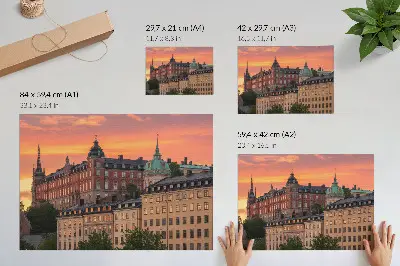 Affiche représentant un coucher de soleil sur des bâtiments charmants à l'atmosphère historique