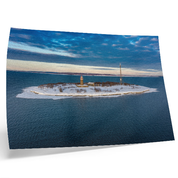 Affiche et poster Île hivernale avec un phare et une mer bleue