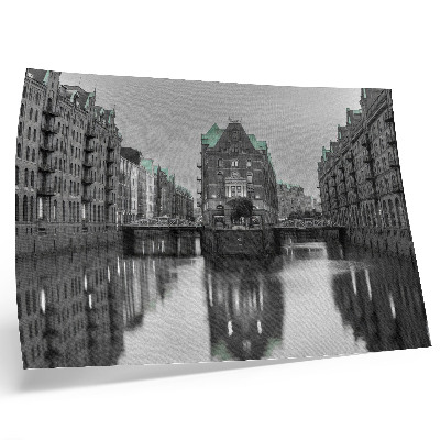 Affiche décorative Canal bordé de bâtiments industriels, reflets dans l'eau