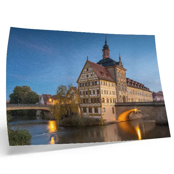 Affiche représentant un bâtiment historique, un pont, de l'eau et un ciel bleu