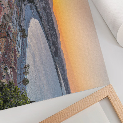 Affiche et poster Vue de la ville au coucher du soleil sur la mer